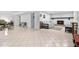 Finished basement with tiled floors, fireplace, and access to the backyard at 106 Palomino Cv, Louisburg, NC 27549