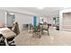Spacious finished basement featuring tile flooring and a dining table set at 106 Palomino Cv, Louisburg, NC 27549