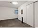 Bedroom features neutral walls, window with blinds, and closet with sliding doors at 106 Palomino Cv, Louisburg, NC 27549