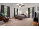 Comfortable bedroom with natural light and generous space at 106 Palomino Cv, Louisburg, NC 27549
