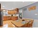 Charming dining area adjacent to the kitchen, featuring ample natural light and a classic design at 106 Palomino Cv, Louisburg, NC 27549