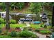 Backyard dock featuring boat and kayak near the house at 106 Palomino Cv, Louisburg, NC 27549