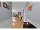 Entryway with hardwood flooring, wainscoting and easy access to living area and backyard at 106 Palomino Cv, Louisburg, NC 27549