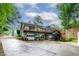 Spacious home with a large deck, garage and driveway at 106 Palomino Cv, Louisburg, NC 27549