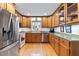 Well-equipped kitchen with stainless steel appliances, and ample counter space at 106 Palomino Cv, Louisburg, NC 27549