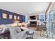 Cozy living room with a fireplace, TV, plush seating, and stylish decor at 106 Palomino Cv, Louisburg, NC 27549
