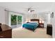 Bedroom featuring sliding glass doors opening to a private balcony at 106 Palomino Cv, Louisburg, NC 27549