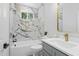 Modern bathroom features marble backsplash, gold hardware, and plenty of counterspace at 107 Seminole Dr, Louisburg, NC 27549