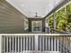 Covered back deck with view to slider entry to home at 107 Seminole Dr, Louisburg, NC 27549