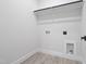 Bright laundry room with washer/dryer hookups at 107 Seminole Dr, Louisburg, NC 27549
