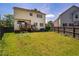 Inviting backyard featuring a deck, fenced perimeter, and ample green space, offering privacy and room for recreation at 11 Piccadilly Ct, Durham, NC 27713