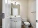 Small bathroom with a white toilet and vanity sink at 11 Piccadilly Ct, Durham, NC 27713