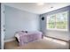 Blue painted bedroom with a closet and comfortable carpet at 11 Piccadilly Ct, Durham, NC 27713