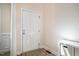 Entryway with white paneled door, and neutral wall color at 11 Piccadilly Ct, Durham, NC 27713