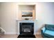A fireplace featuring a black marble hearth and decorative mantle at 11 Piccadilly Ct, Durham, NC 27713
