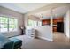 Living Room and Kitchen with an open concept, offering a spacious living area with lots of natural light at 11 Piccadilly Ct, Durham, NC 27713