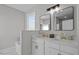 Elegant bathroom features dual sinks, granite countertops, and modern fixtures at 1101 Ridge Rd, Roxboro, NC 27573