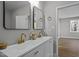 Bathroom features a double sink vanity, modern fixtures, and bright lighting at 1101 Ridge Rd, Roxboro, NC 27573