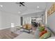 Bright, open living space with modern furnishings, hardwood floors, and stylish decor at 1101 Ridge Rd, Roxboro, NC 27573