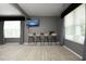 Finished basement with bar, TV, and seating at 1106 Red Crest Ln, Durham, NC 27704