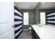 Bathroom featuring a shower with a blue and white curtain and gray flooring at 1106 Red Crest Ln, Durham, NC 27704
