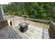 Wooden deck features built-in railings and ample space for relaxing or entertaining guests at 1106 Red Crest Ln, Durham, NC 27704