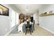 View of kitchen and dining area with table and chairs; access to patio at 1106 Red Crest Ln, Durham, NC 27704