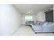 Bright living room featuring a comfortable sectional sofa and a natural wood coffee table at 1106 Red Crest Ln, Durham, NC 27704