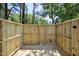 Private outdoor space, perfect for relaxation, surrounded by a wooden fence at 112 Carmichael Ct, Cary, NC 27511