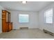 Bright dining area with natural light and an antique hutch at 11234 Nc Hwy 50, Benson, NC 27504