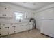 Bright kitchen showcasing white cabinets, neutral countertops, and modern appliances at 11234 Nc Hwy 50, Benson, NC 27504