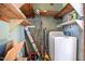 The laundry room features a white washing machine, wooden shelves, and painted walls at 11234 Nc Hwy 50, Benson, NC 27504