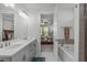 Beautiful bathroom with a double vanity, tub, and shower at 116 Alumroot Rd, Holly Springs, NC 27540
