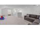 Spacious bonus room area with neutral decor and ample natural light at 116 Alumroot Rd, Holly Springs, NC 27540