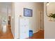 This hallway features hardwood floors and stylish storage at 116 Weaver Mine Trl, Chapel Hill, NC 27517
