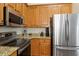 Well-equipped kitchen with granite counters and stainless steel appliances at 116 Weaver Mine Trl, Chapel Hill, NC 27517