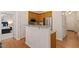 Open kitchen layout featuring stainless appliances and granite countertops at 116 Weaver Mine Trl, Chapel Hill, NC 27517