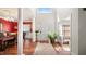 Elegant foyer with high ceilings, hardwood floors, decorative columns, and abundant natural light at 1258 Jamestowne Dr, Elon, NC 27244