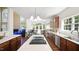 Open concept kitchen with an island and stainless steel appliances at 1258 Jamestowne Dr, Elon, NC 27244