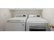 Convenient laundry room featuring a modern washer and dryer at 1258 Jamestowne Dr, Elon, NC 27244