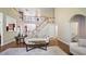 Spacious living room with high ceilings, hardwood floors, and a staircase overlooking the space at 1258 Jamestowne Dr, Elon, NC 27244