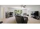 Spacious living room with a large window, entertainment center, and leather sofa at 1258 Jamestowne Dr, Elon, NC 27244
