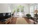 Sun-filled room with views of the garden and outdoor living at 1258 Jamestowne Dr, Elon, NC 27244