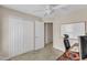 Bedroom with neutral carpet, ceiling fan, and closet space at 127 Deacon Ridge St, Wake Forest, NC 27587
