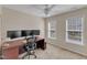 Home office with a computer, desk, and natural light at 127 Deacon Ridge St, Wake Forest, NC 27587