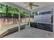 Covered and screened porch overlooking backyard at 127 Deacon Ridge St, Wake Forest, NC 27587