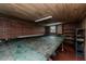 Unfinished basement space featuring a workbench, and ample room for storage or customization at 1706 Carthage St, Sanford, NC 27330