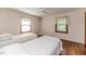 Comfortable bedroom with hardwood floors and twin beds at 1706 Carthage St, Sanford, NC 27330