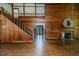 Elegant living room with a wooden staircase, fireplace, and open floor plan at 1706 Carthage St, Sanford, NC 27330