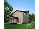 This new two-story home has a screened in porch/patio overlooking a lawn surrounded by mature trees and shrubs at 1809 Bennett St, Raleigh, NC 27604
